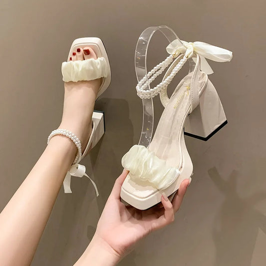 Low Block Heeled Sandals With A Pearl Ankle Strap